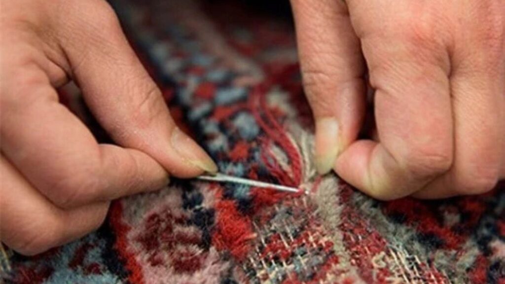 Professional carpet repair process including stretching patching and seam fixing